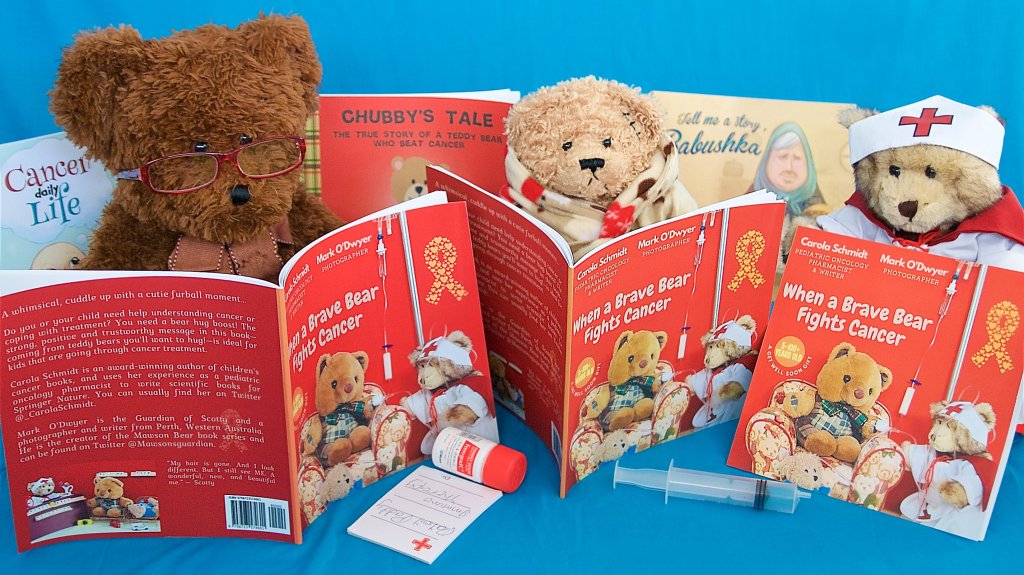 Three of the bears in the book read their copies. You can see Dr Caddy wearing her specs, patient Stiches in his dressing gown, and Nurse Bree.