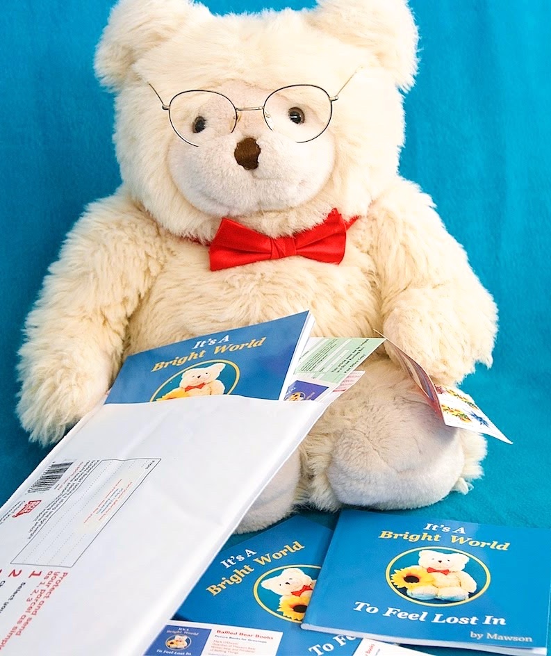 Mawson Bear getting ready to post a copy of his book, Its A Bright World to Feel Lost In