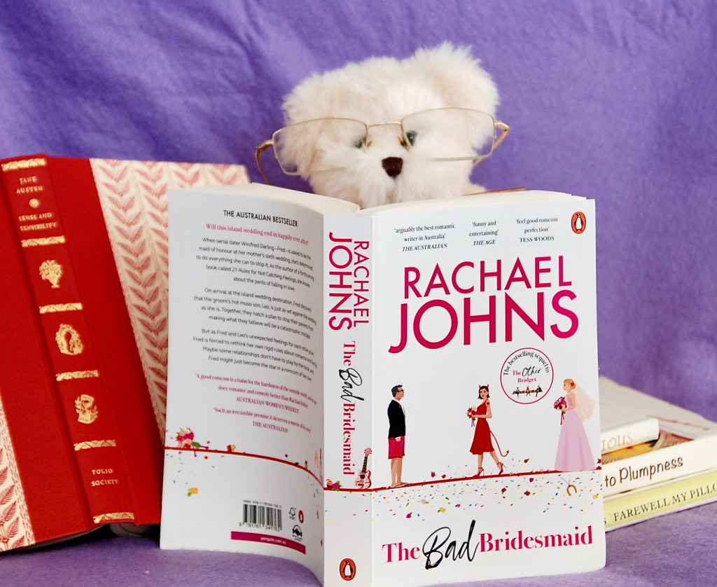 Rachel Johns novel the Bad Bridesmaid is avidly read by our romance loving bear, Lizbeth